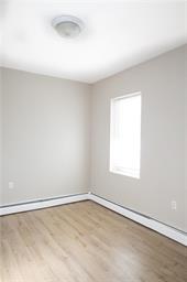 344 Bushkill Street, Unit 2 Easton, PA 18042 - Photo 10 of 30 A quiet retreat with durable flooring awaits, offering a tranquil space for rest and rejuvenation.