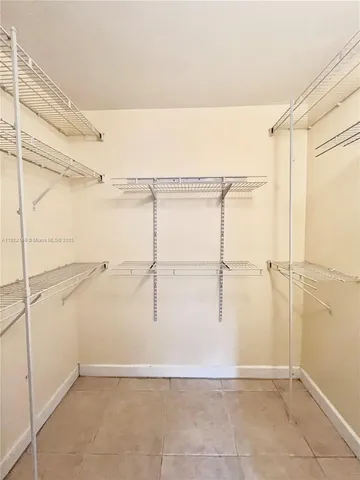 a view of a room with racks on the wall