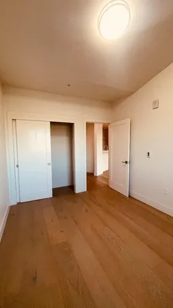 a bathroom with a toilet and a bathtub