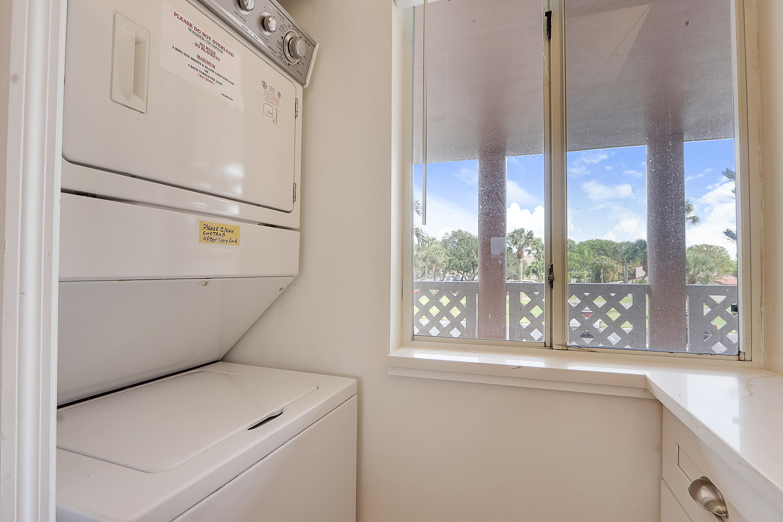 353 Highway 1, Unit A207 Jupiter, FL 33477 - Photo 20 of 28 a utility room with dryer and washer