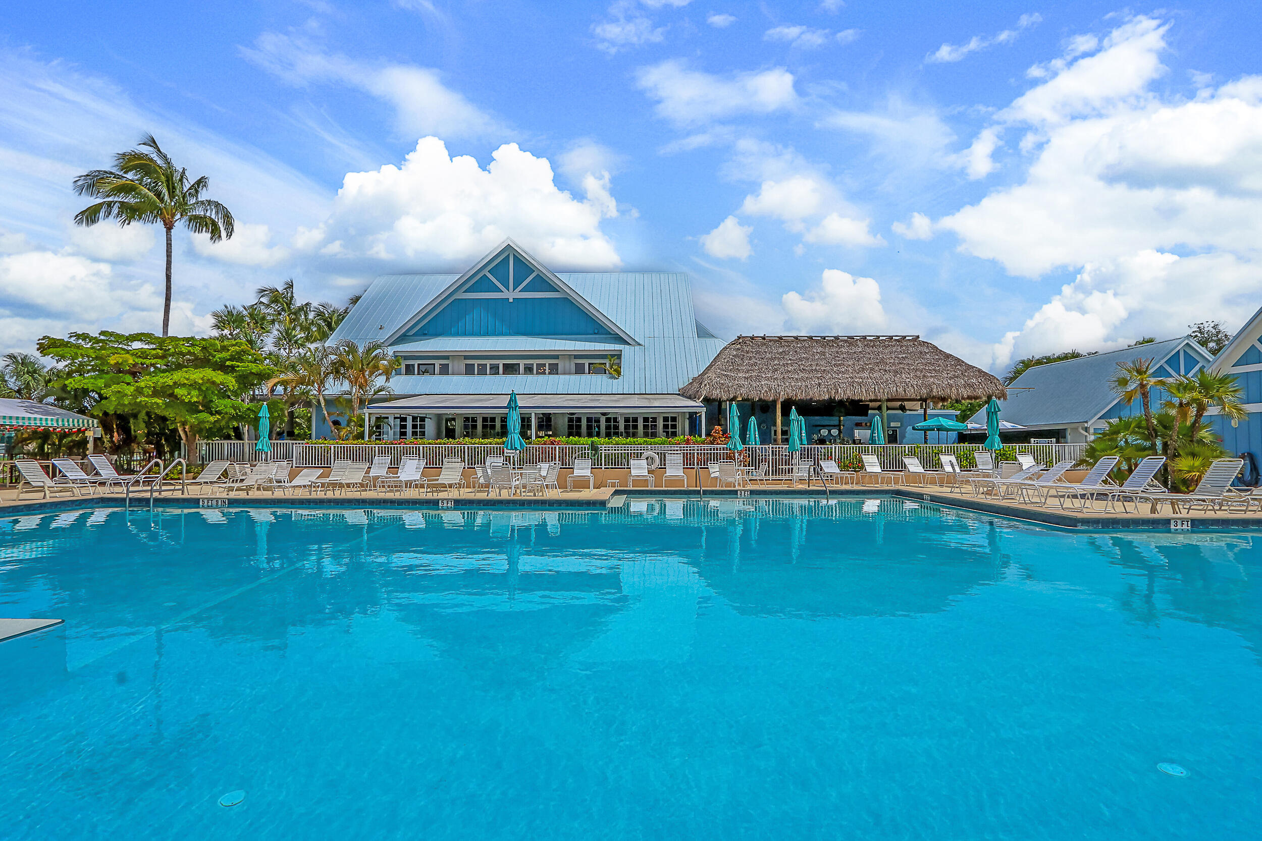 353 Highway 1, Unit A207 Jupiter, FL 33477 - Photo 25 of 28 a front view of a house with garden