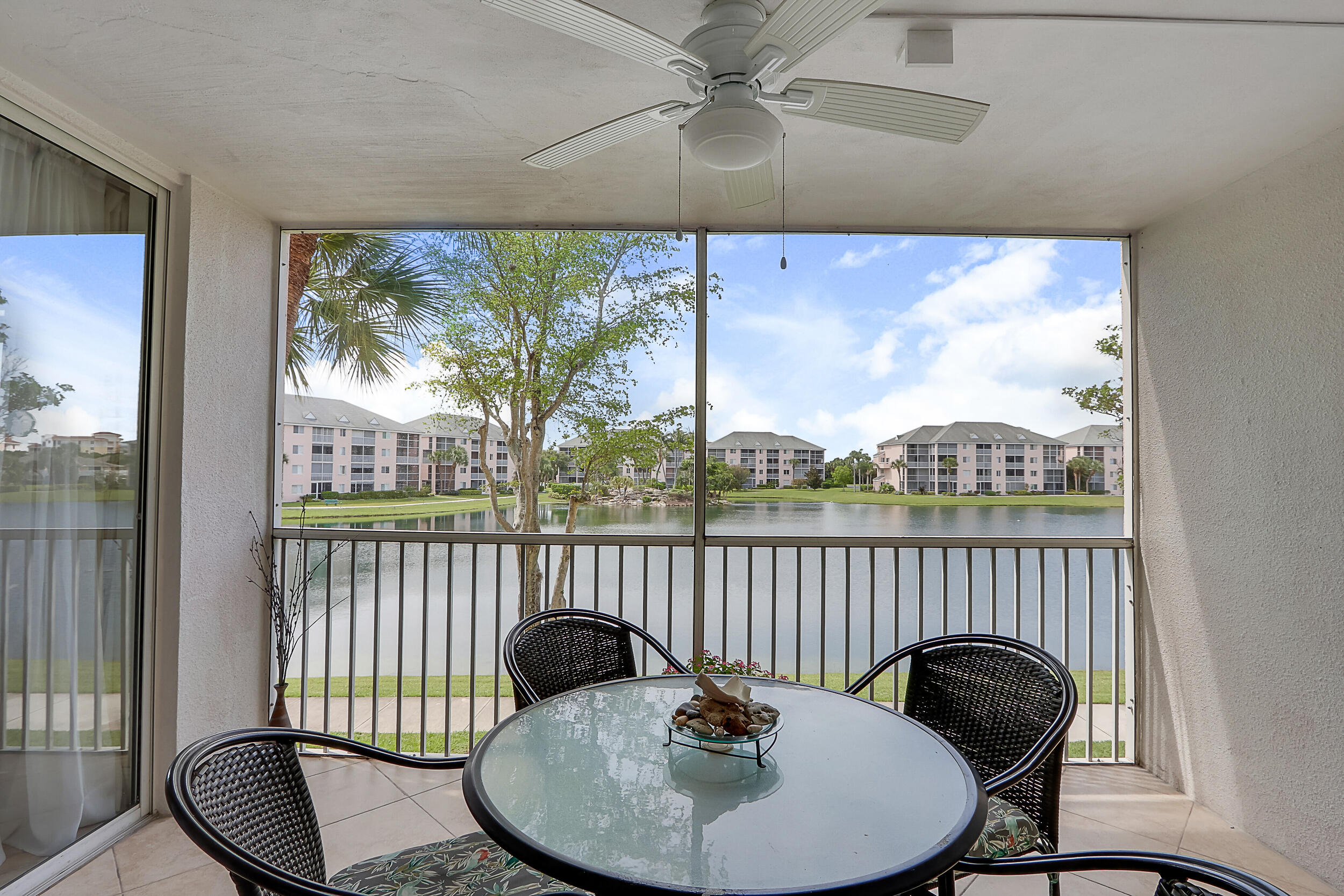 353 Highway 1, Unit A207 Jupiter, FL 33477 - Photo 27 of 28 a view of a dining room with furniture window and outside view