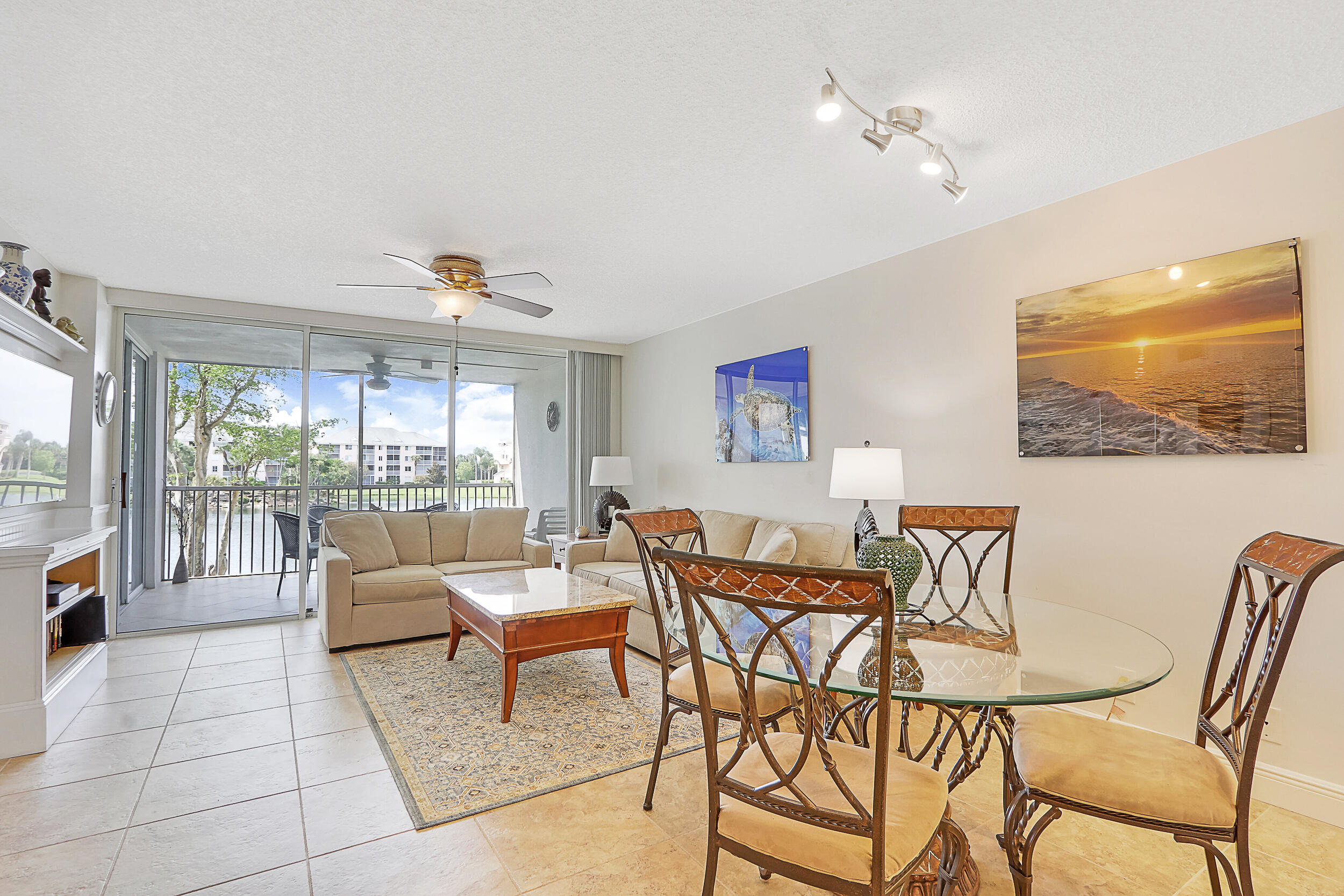 353 Highway 1, Unit A207 Jupiter, FL 33477 - Photo 5 of 28 a dining room with furniture and window