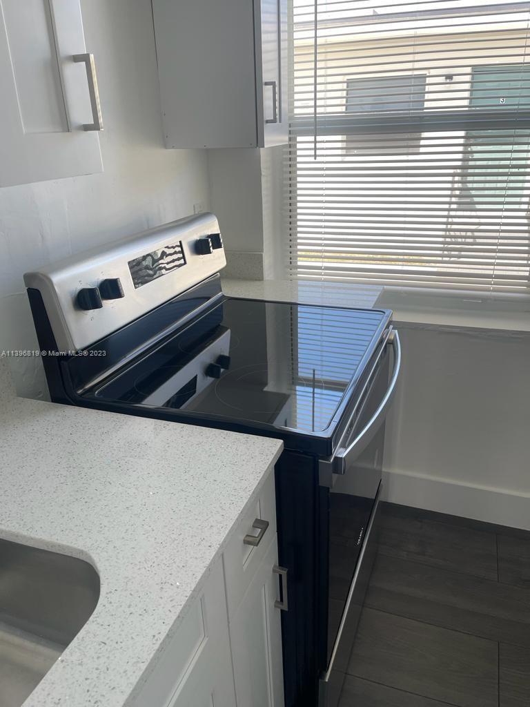 Allapattah Miami, FL 33142 - Photo 3 of 3 a utility room with dryer and washer