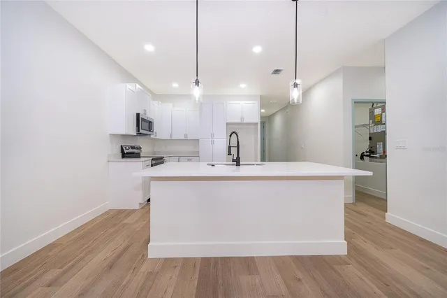 a view of a big room with wooden floor