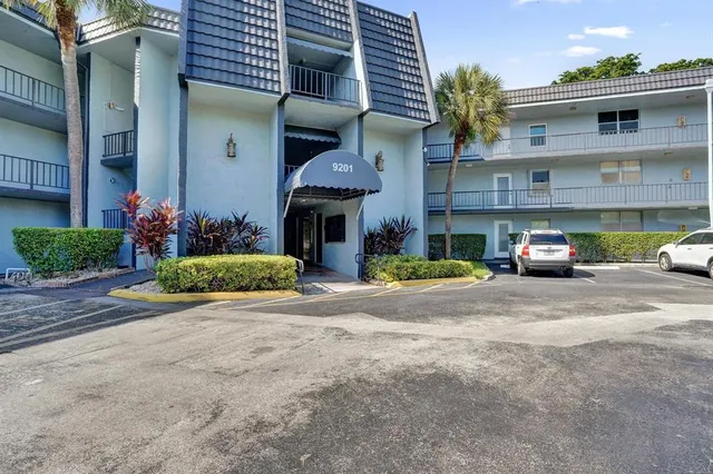 a car parked in front of a building