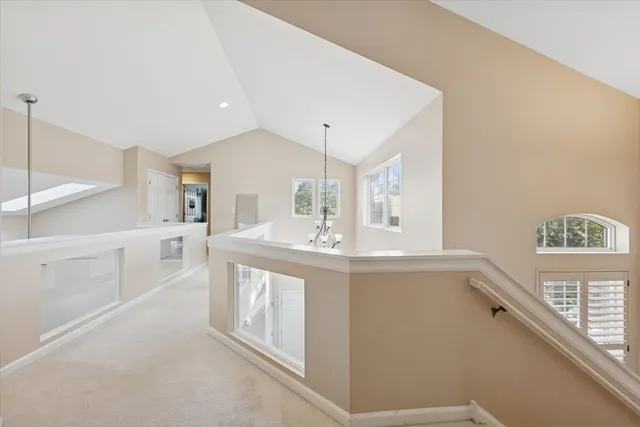 a bathroom with a sink a large mirror and a bathtub