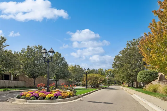a view of a swimming pool with a yard