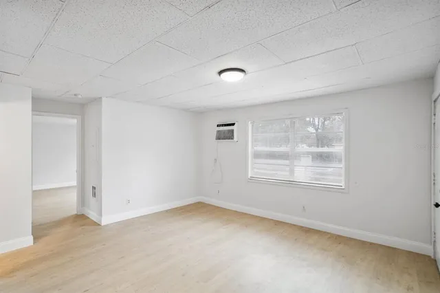 an empty room with windows