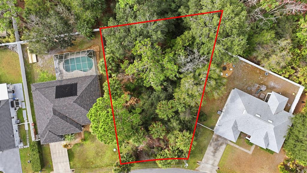 4 Piccadilly Place Palm Coast, FL 32164 - Photo 2 of 7 an aerial view of a house