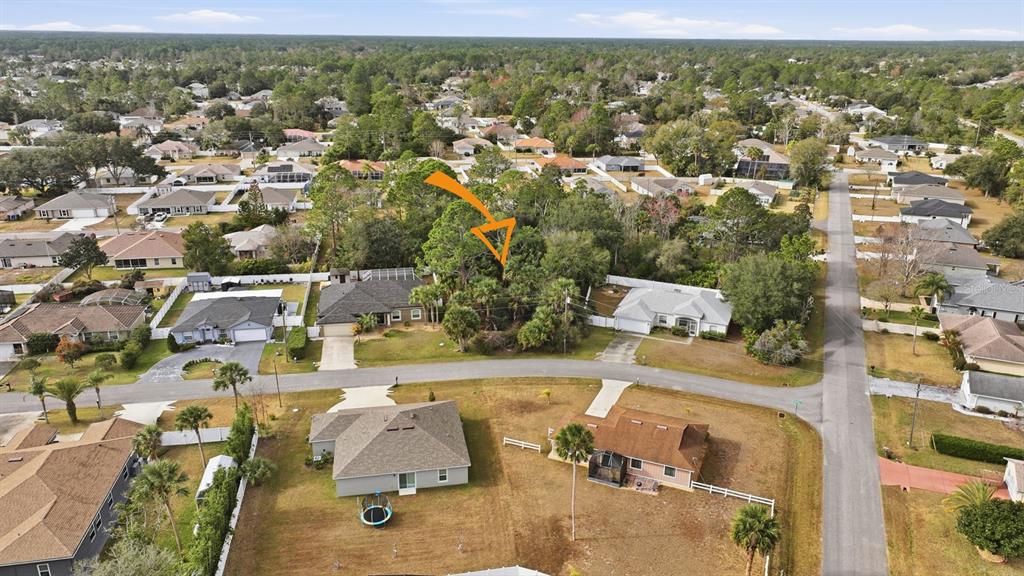 4 Piccadilly Place Palm Coast, FL 32164 - Photo 7 of 7 an aerial view of residential houses with outdoor space