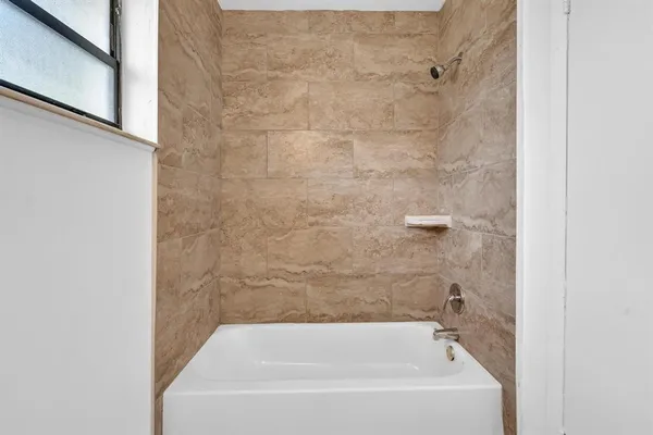 a bathroom with a bathtub