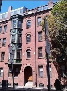 a front view of a multi story residential apartment building