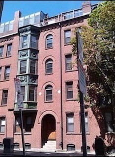 a front view of a multi story residential apartment building