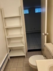 69 North Margin Street, Unit B Boston, MA 02113 - Photo 10 of 15 a bathroom with a bathtub