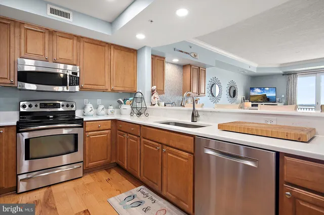 a bathroom with a tub sink and a mirror