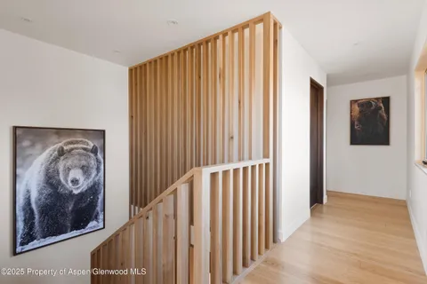 a view of a entryway with wooden floor