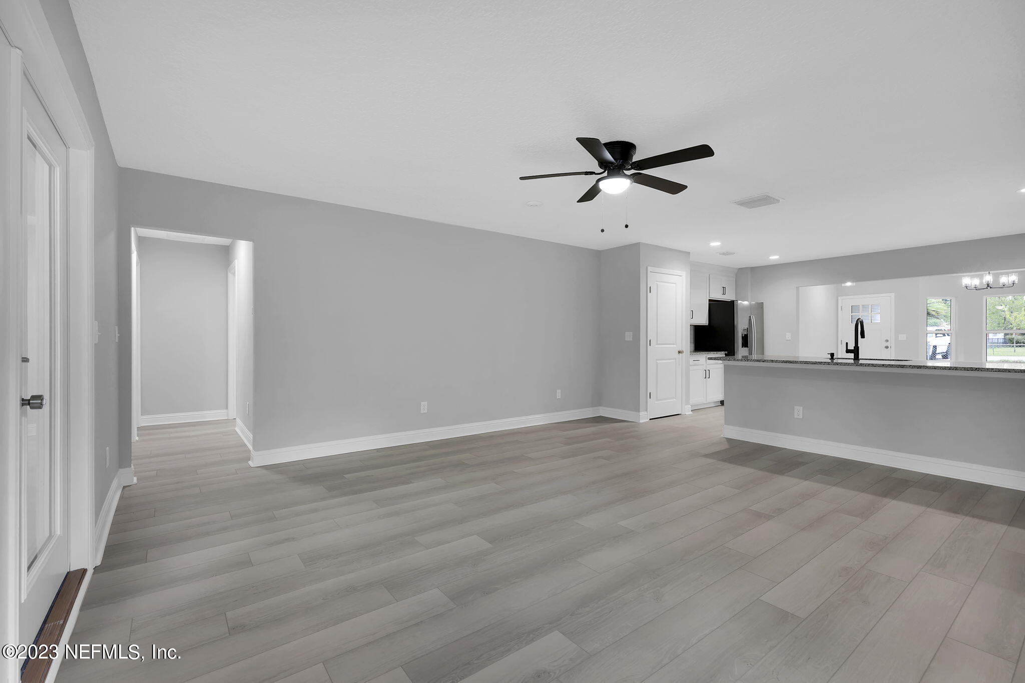 13216 Yellow Bluff Road Jacksonville, FL 32226 - Photo 13 of 28 a view of an empty room with a kitchen