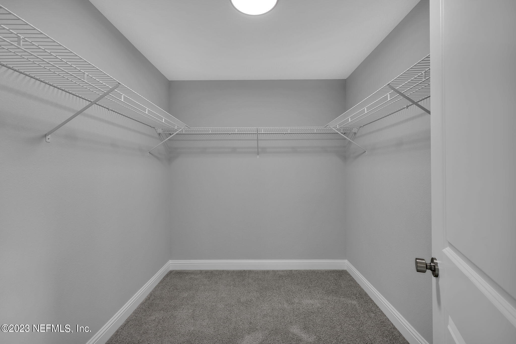 13216 Yellow Bluff Road Jacksonville, FL 32226 - Photo 21 of 28 a view of an empty walk in closet