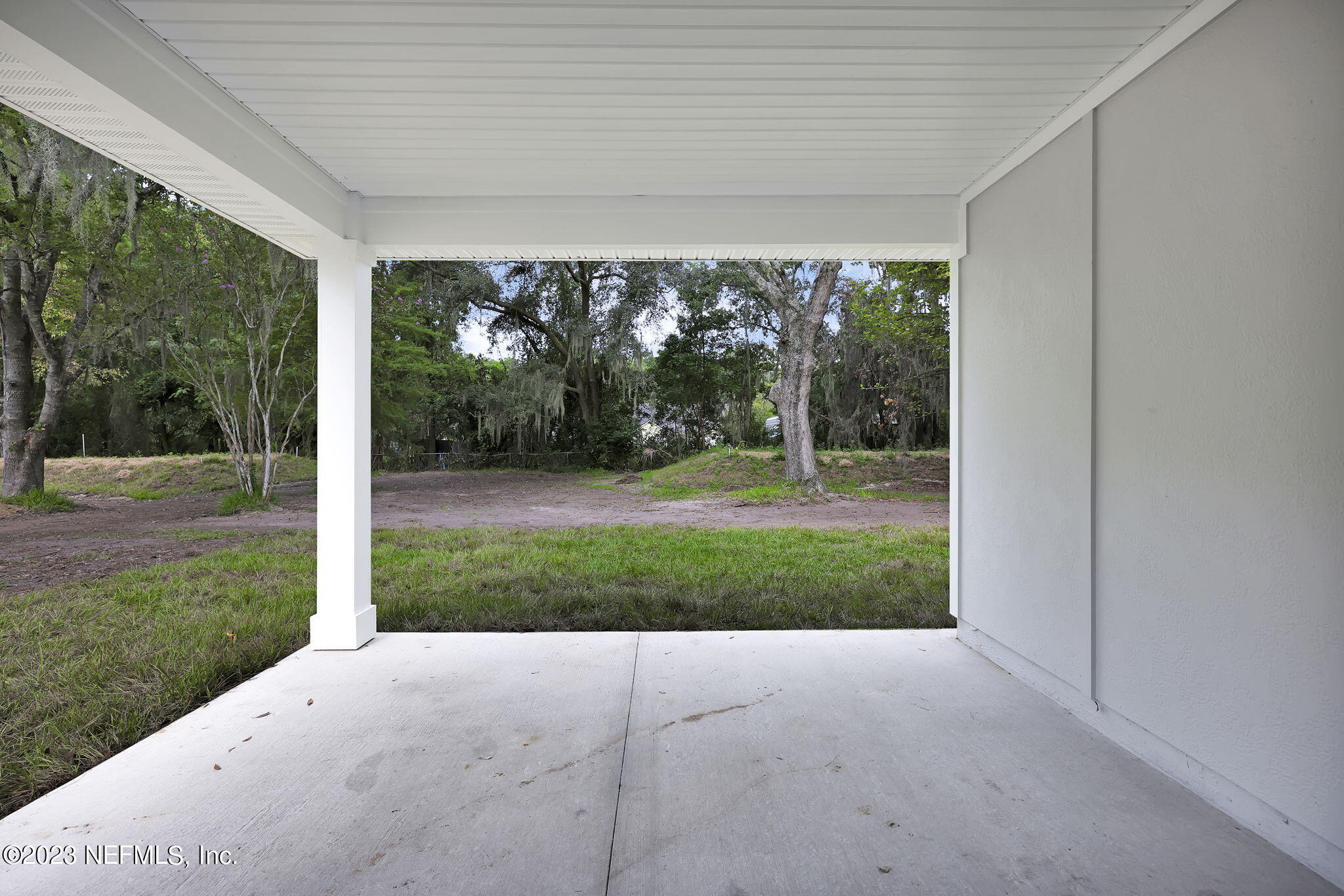 13216 Yellow Bluff Road Jacksonville, FL 32226 - Photo 24 of 28 a view of a porch with a yard