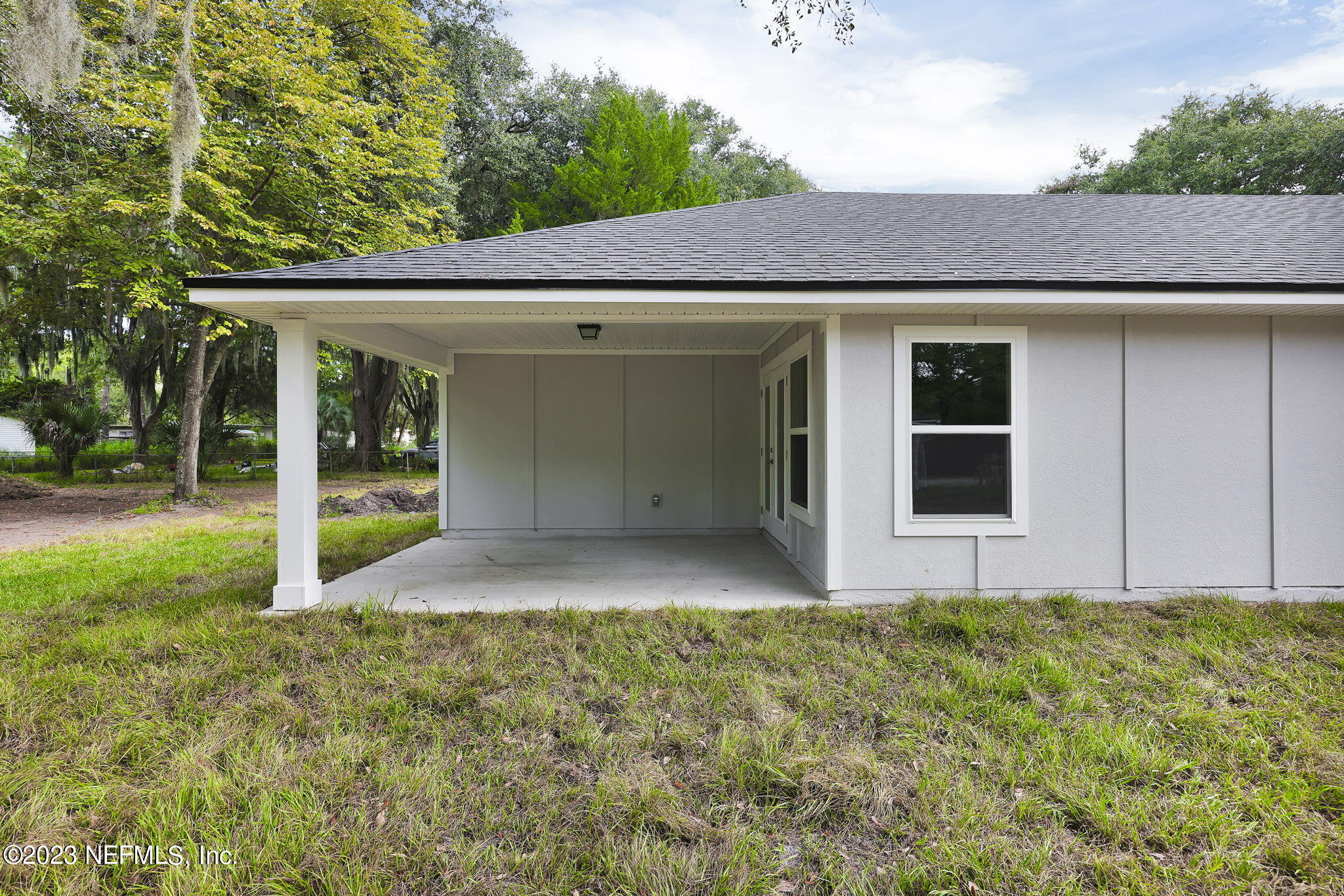 13216 Yellow Bluff Road Jacksonville, FL 32226 - Photo 25 of 28 a view of an house with backyard and garden