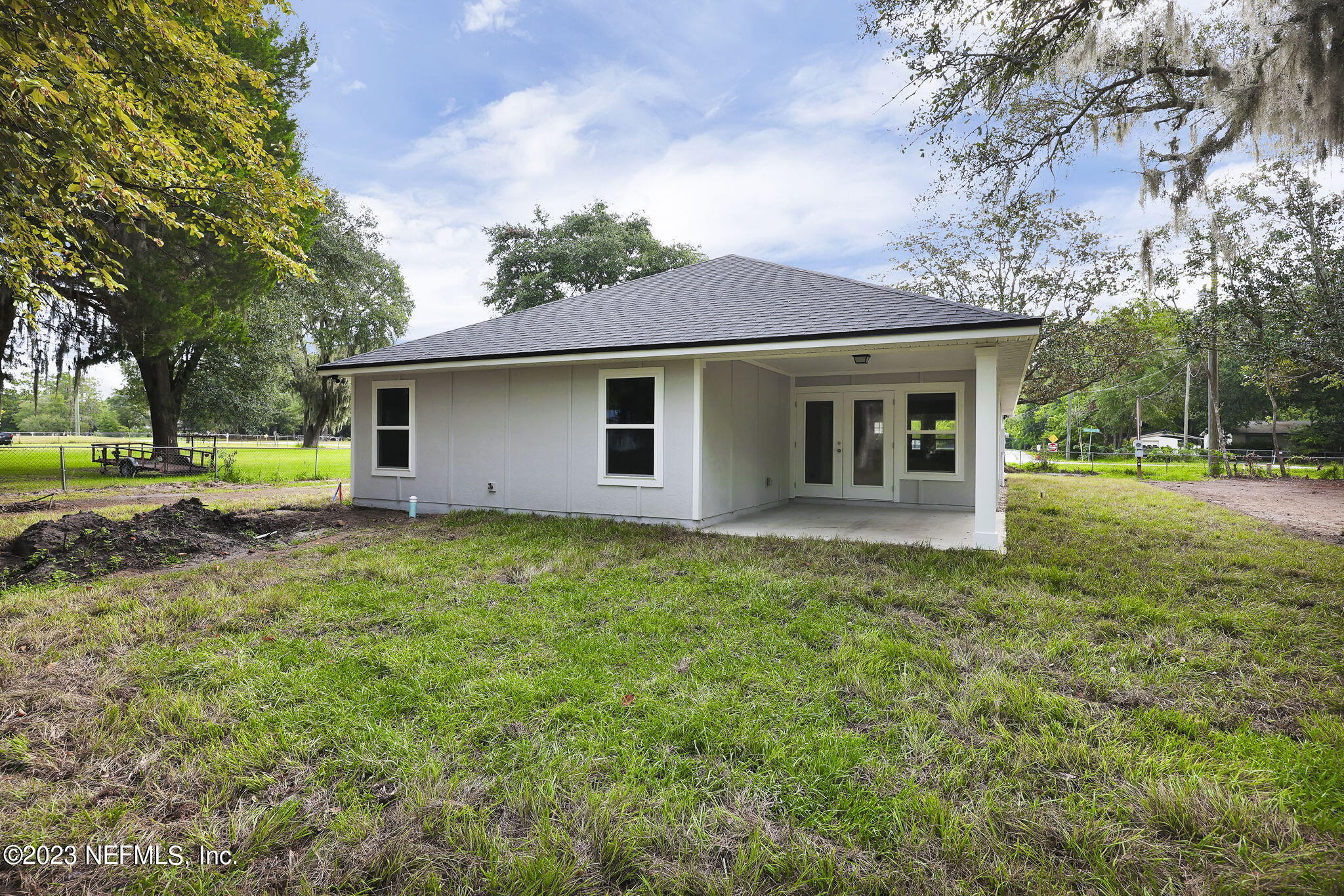 13216 Yellow Bluff Road Jacksonville, FL 32226 - Photo 27 of 28 a backyard of a house with lots of green space
