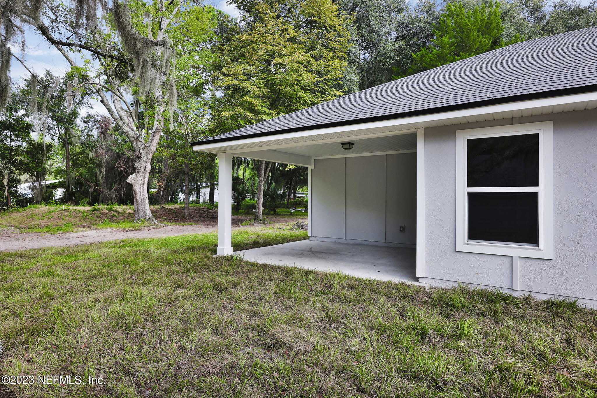 13216 Yellow Bluff Road Jacksonville, FL 32226 - Photo 28 of 28 a view of an house with backyard space and garden