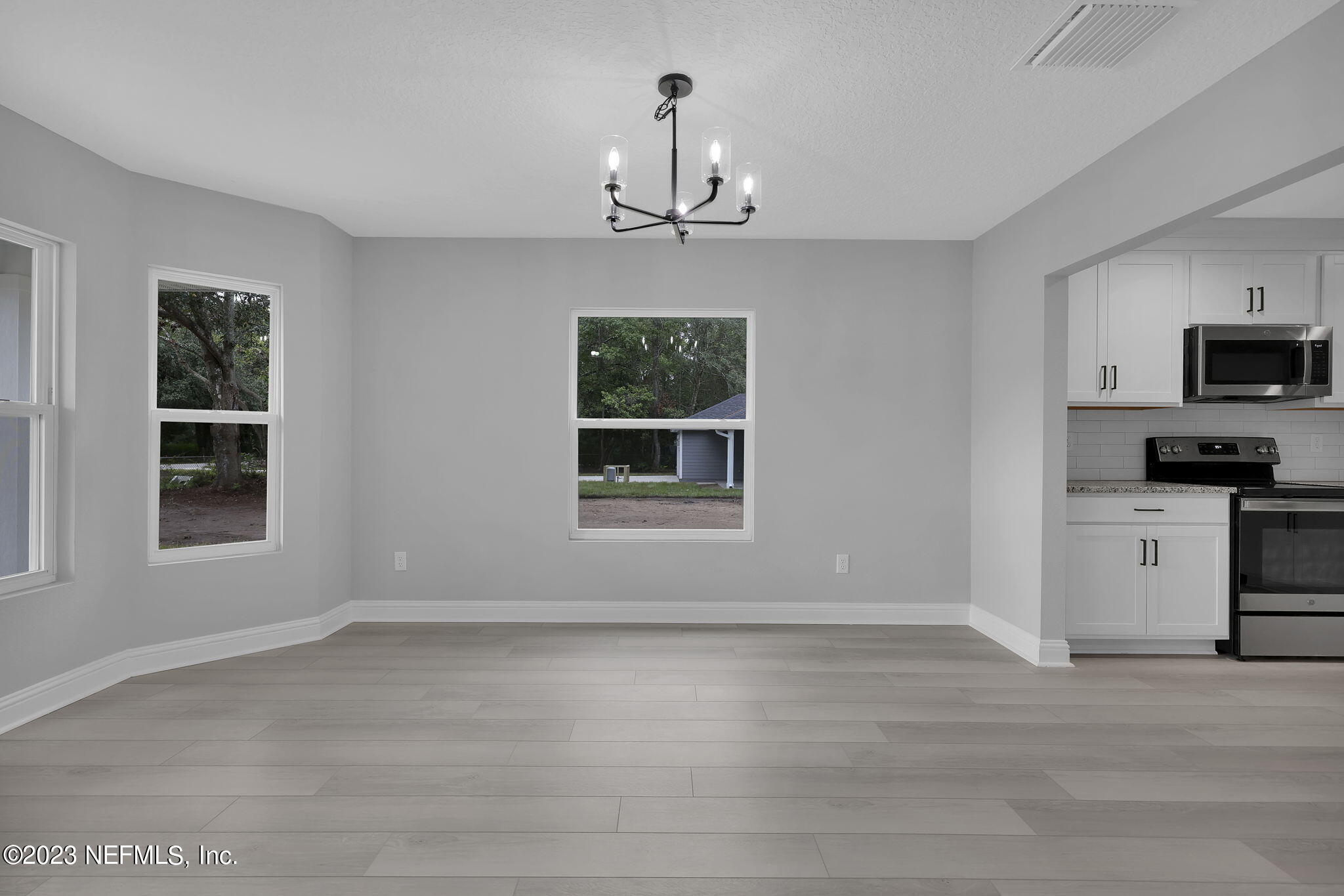 13216 Yellow Bluff Road Jacksonville, FL 32226 - Photo 4 of 28 a view of livingroom with kitchen sink and window