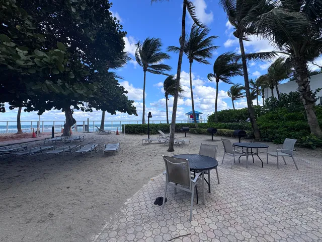 a view of a balcony with an ocean view
