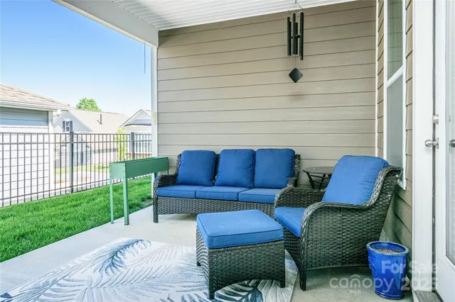 a outdoor space with a couch and swing