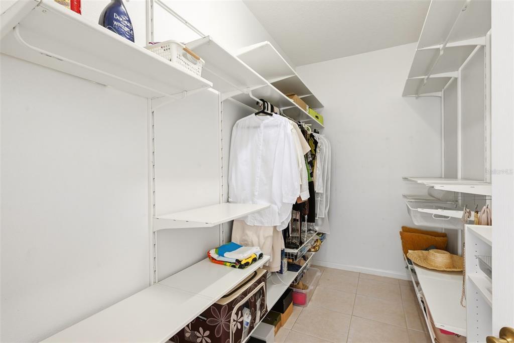 936 Kingsridge Circle Gotha, FL 34734 - Photo 14 of 50 a bathroom with a sink mirror vanity and toilet