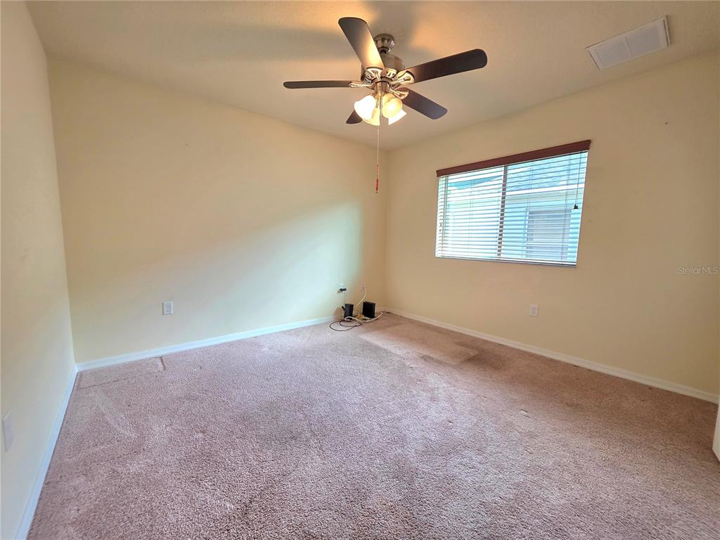 4284 High Ridge Avenue Spring Hill, FL 34609 - Photo 29 of 40 a view of an empty room with a window