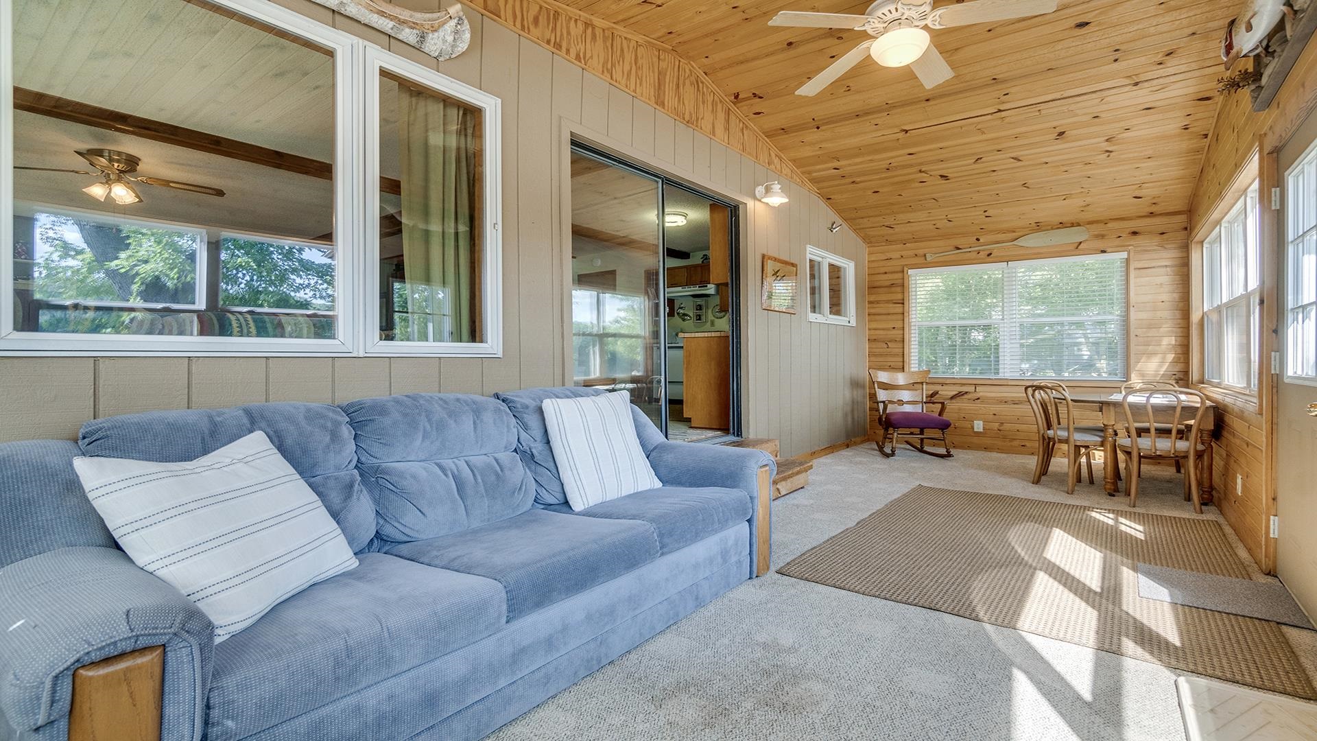 2859 South Brooks Island Road Oregon, IL 61061 - Photo 13 of 39 a living room with furniture and a large window