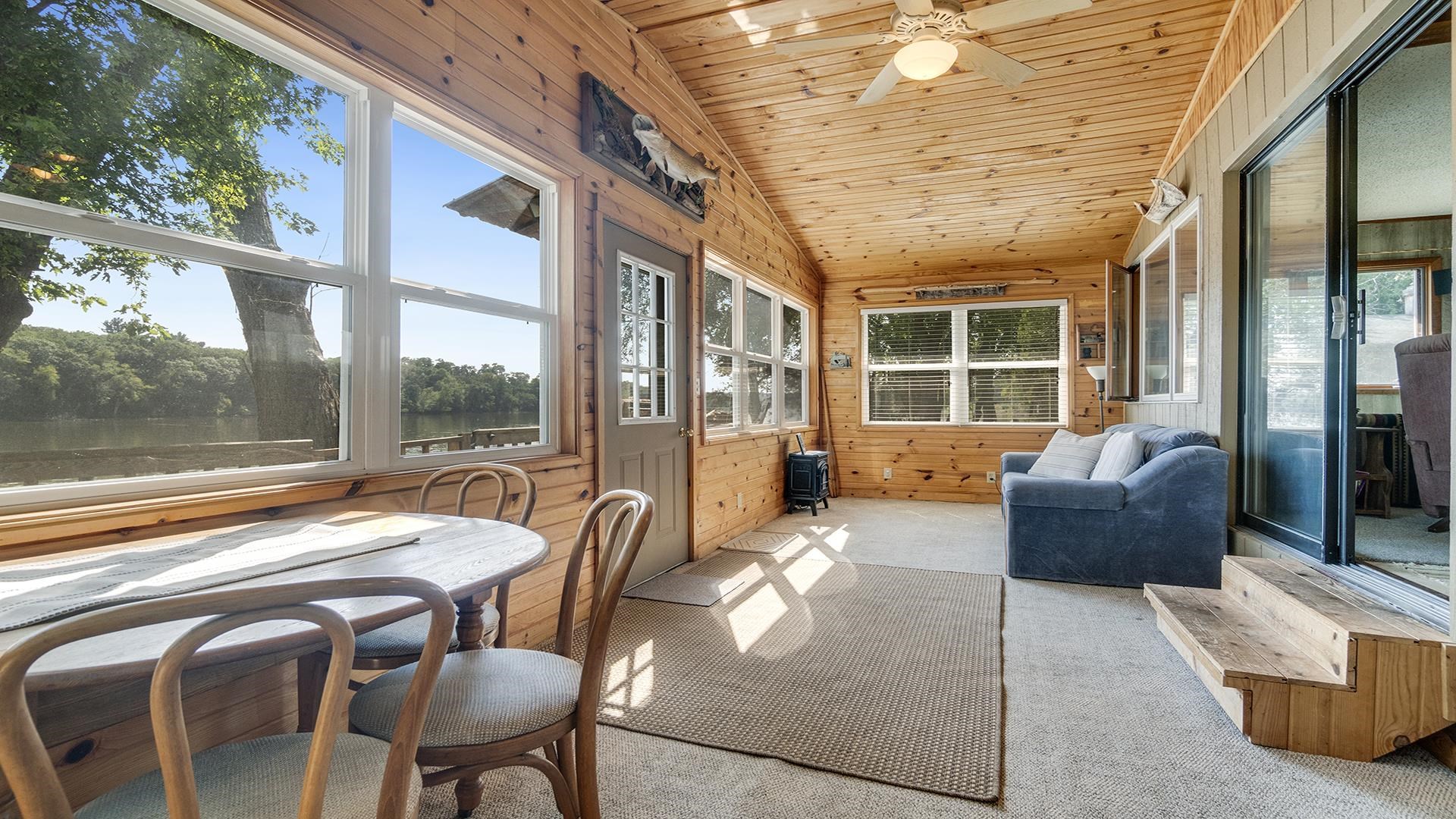 2859 South Brooks Island Road Oregon, IL 61061 - Photo 14 of 39 a balcony with furniture and a potted plant