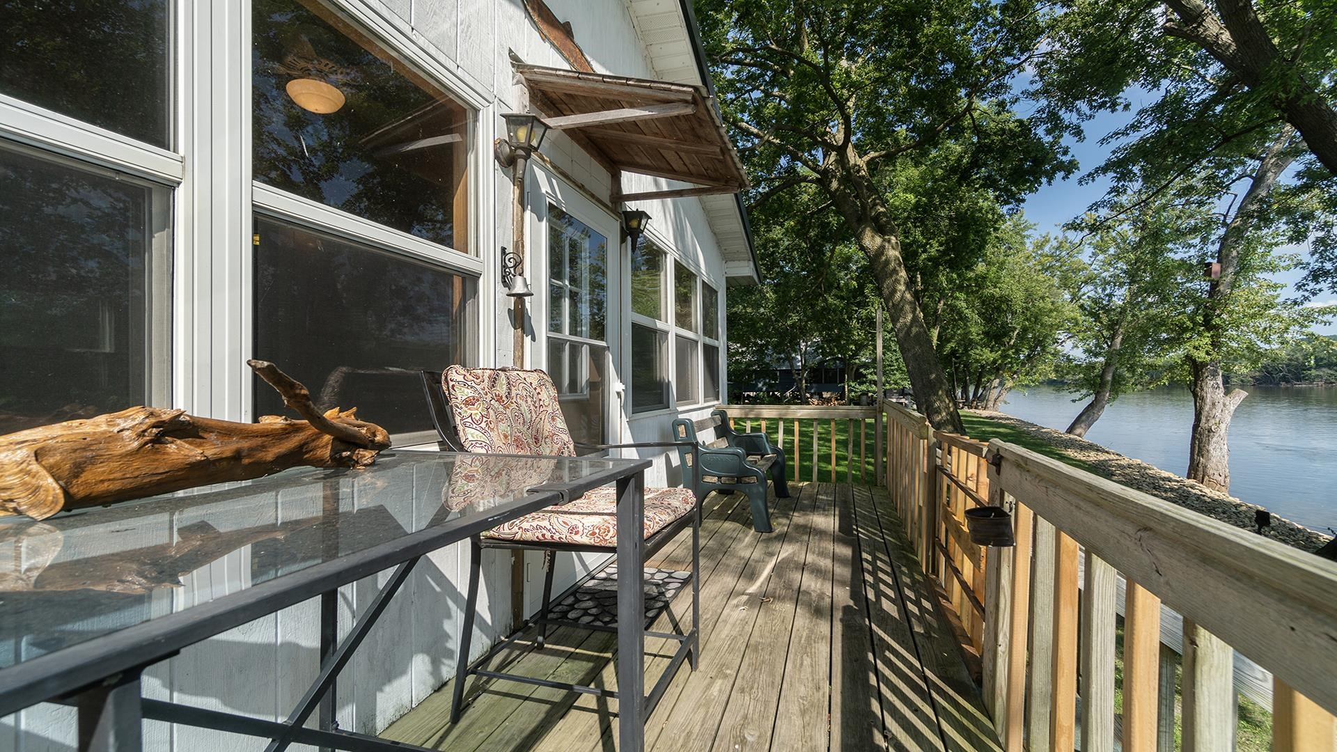 2859 South Brooks Island Road Oregon, IL 61061 - Photo 17 of 39 a view of balcony with wooden floor and outdoor seating