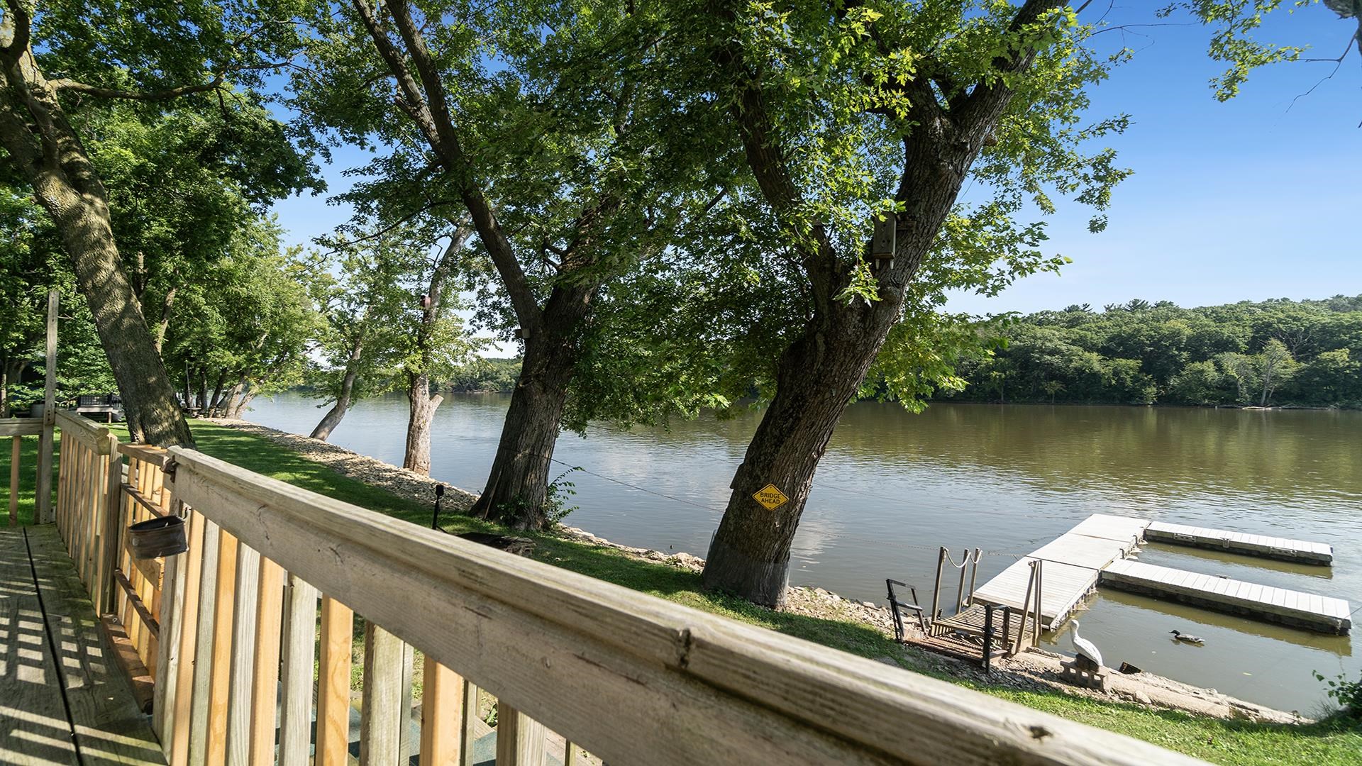 2859 South Brooks Island Road Oregon, IL 61061 - Photo 18 of 39 a view of a lake from a balcony