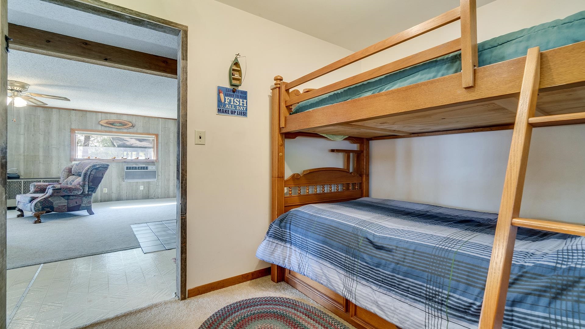 2859 South Brooks Island Road Oregon, IL 61061 - Photo 21 of 39 a bedroom with furniture and a window