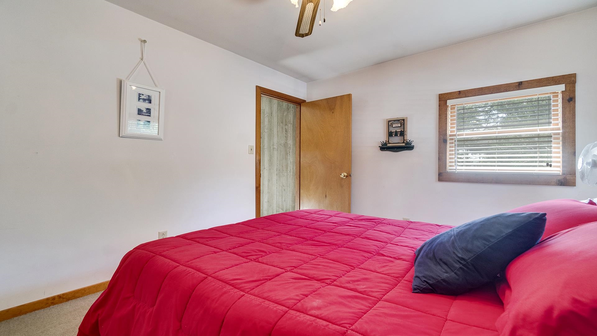 2859 South Brooks Island Road Oregon, IL 61061 - Photo 23 of 39 a bedroom with a bed and a window
