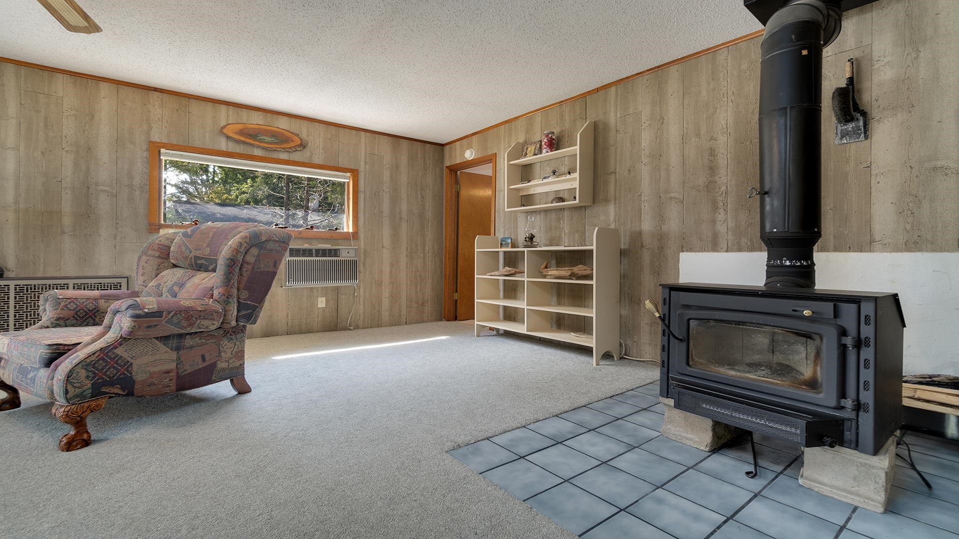 2859 South Brooks Island Road Oregon, IL 61061 - Photo 3 of 39 a living room with furniture and a fireplace