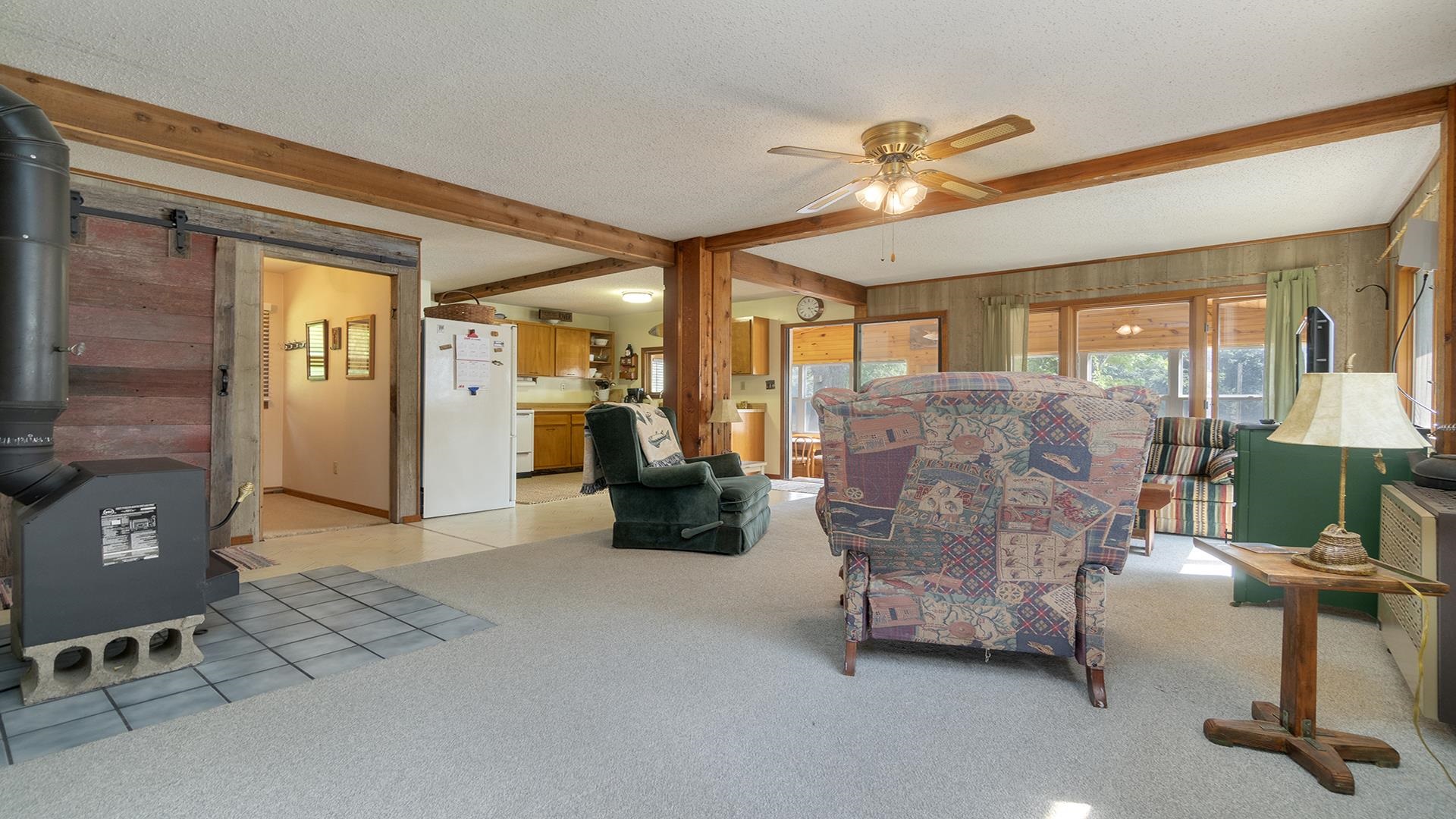 2859 South Brooks Island Road Oregon, IL 61061 - Photo 4 of 39 a living room with furniture and a chandelier