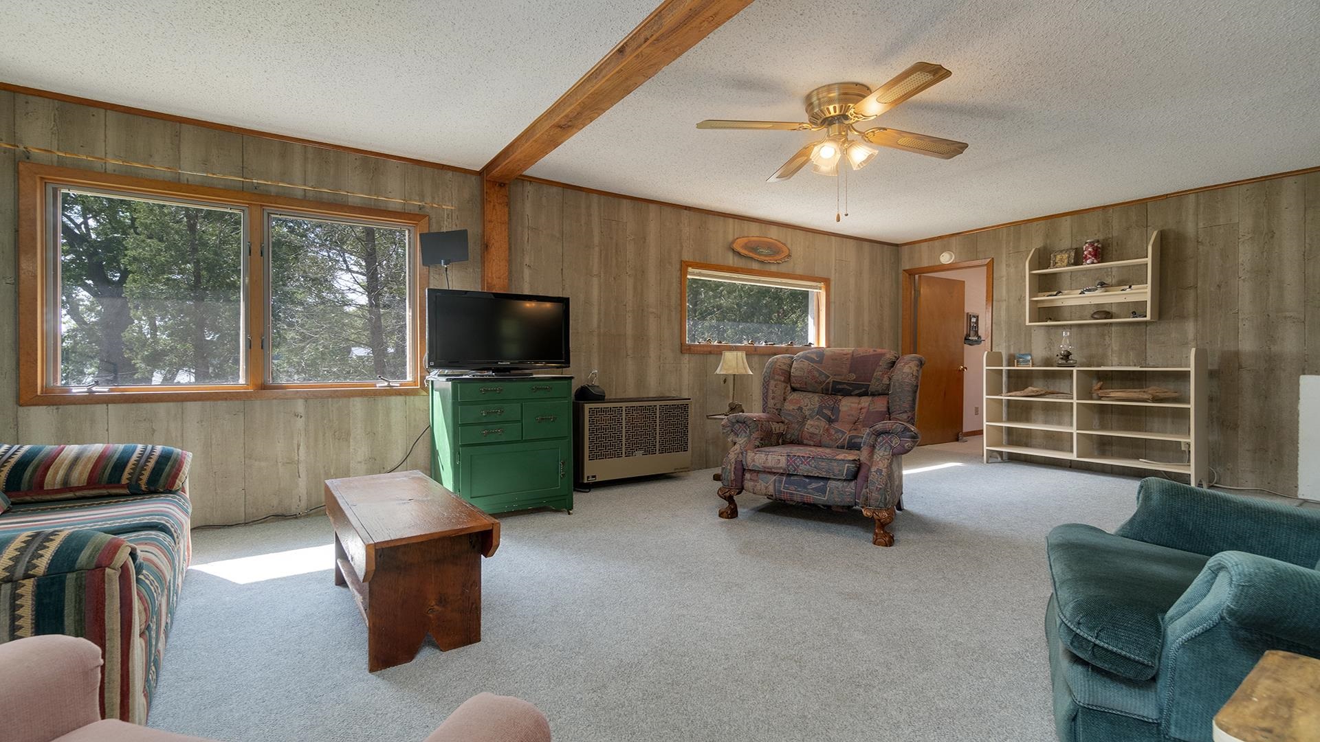 2859 South Brooks Island Road Oregon, IL 61061 - Photo 6 of 39 a living room with furniture and a flat screen tv
