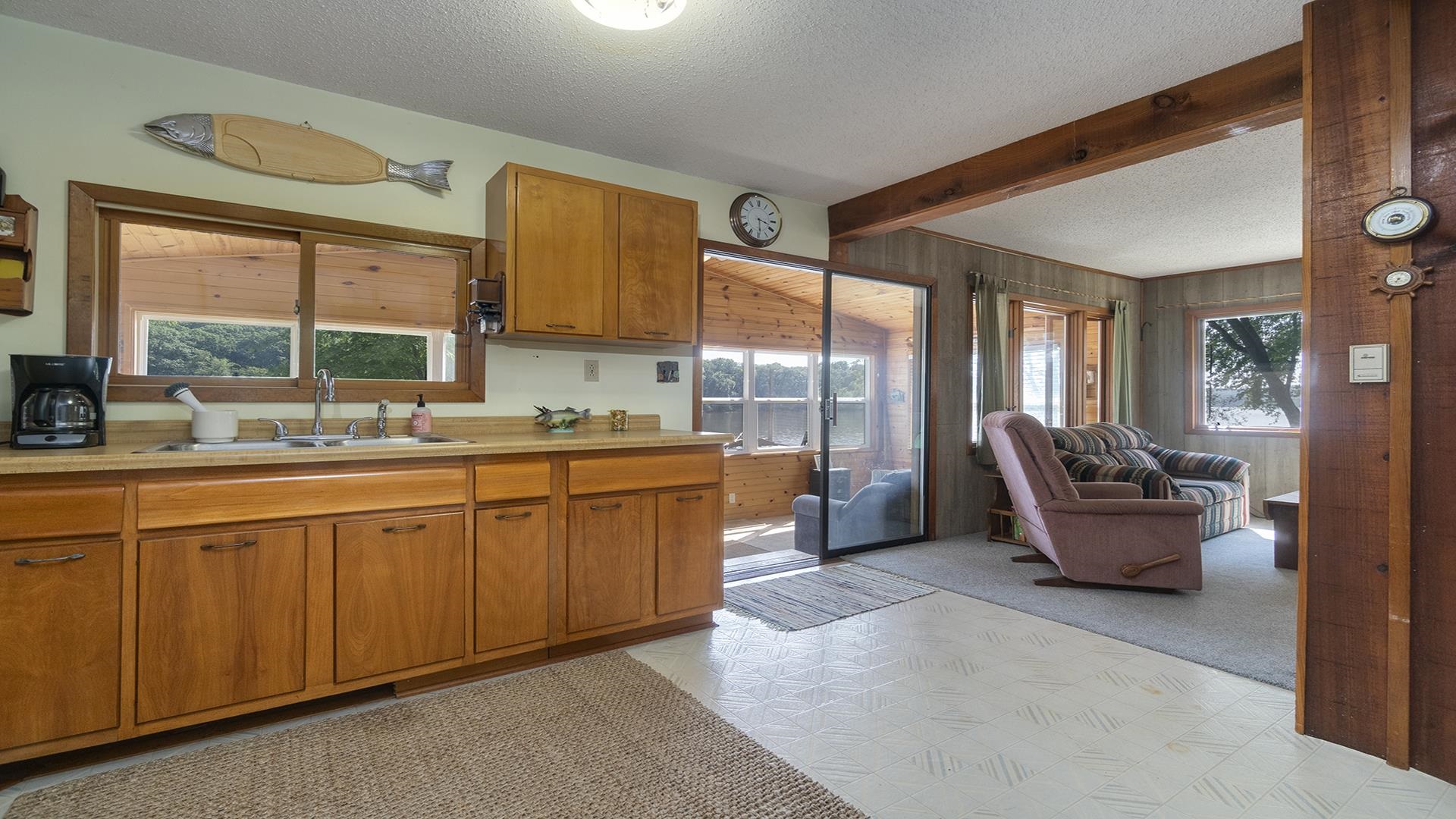 2859 South Brooks Island Road Oregon, IL 61061 - Photo 10 of 39 a large living room with large windows