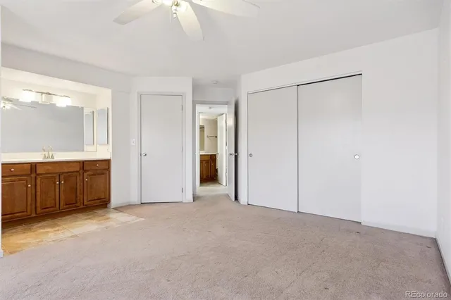a view of an empty room with a bathroom