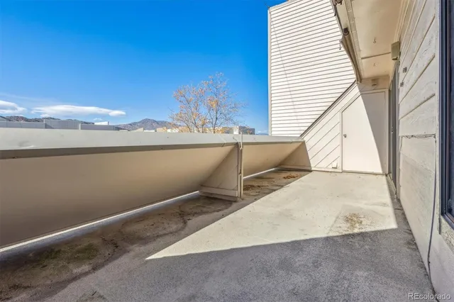 a view of a balcony with an outdoor space
