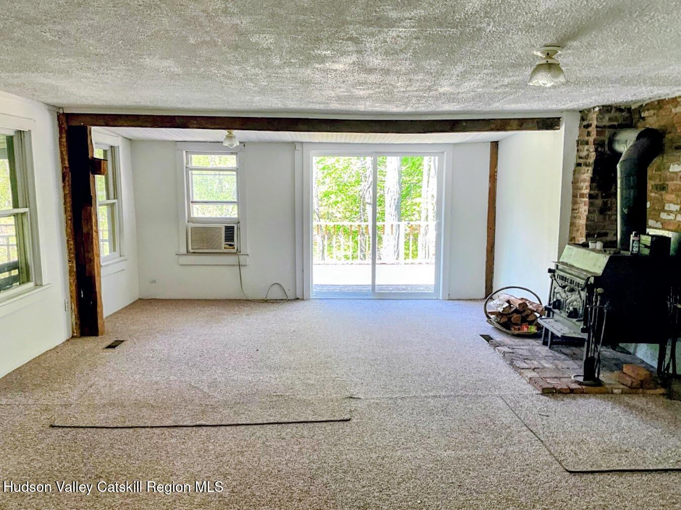 707 Springtown Road Tillson, NY 12486 - Photo 11 of 46 a livingroom with window