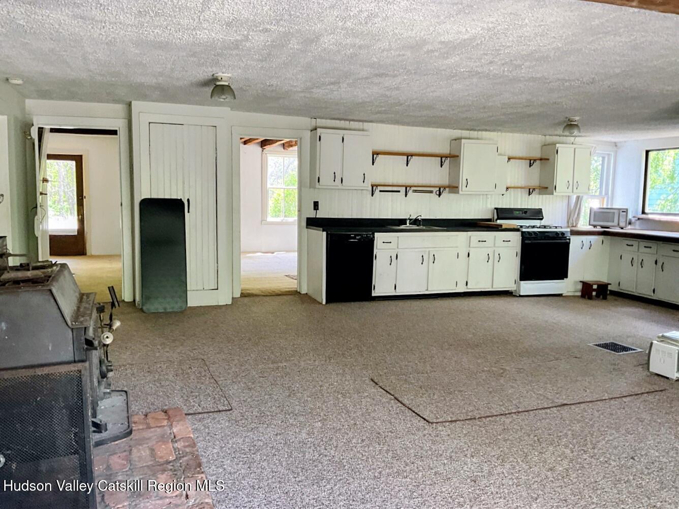 707 Springtown Road Tillson, NY 12486 - Photo 21 of 46 a view of a kitchen with a sink