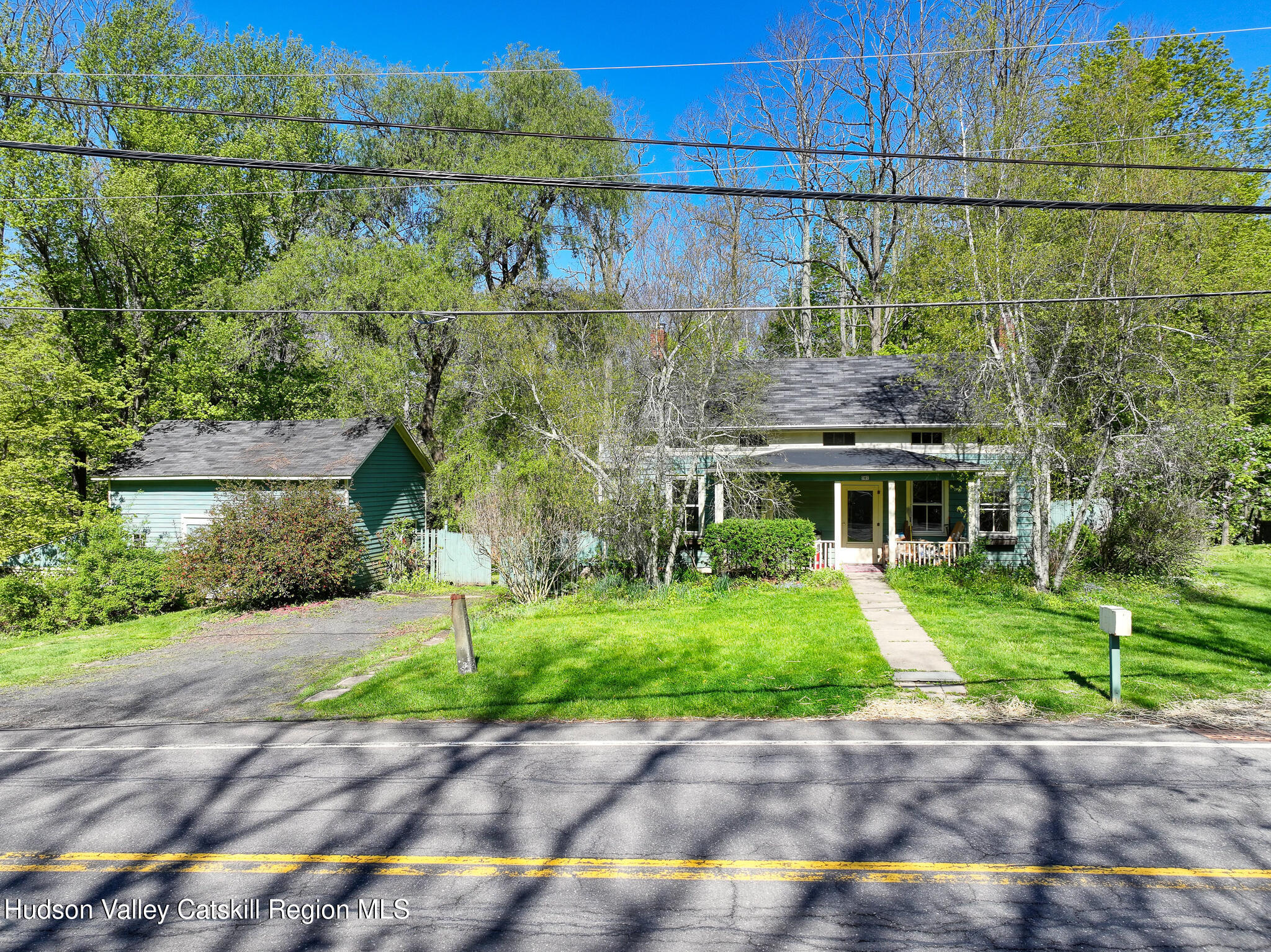 707 Springtown Road Tillson, NY 12486 - Photo 42 of 46 a aerial view of a house with a yard