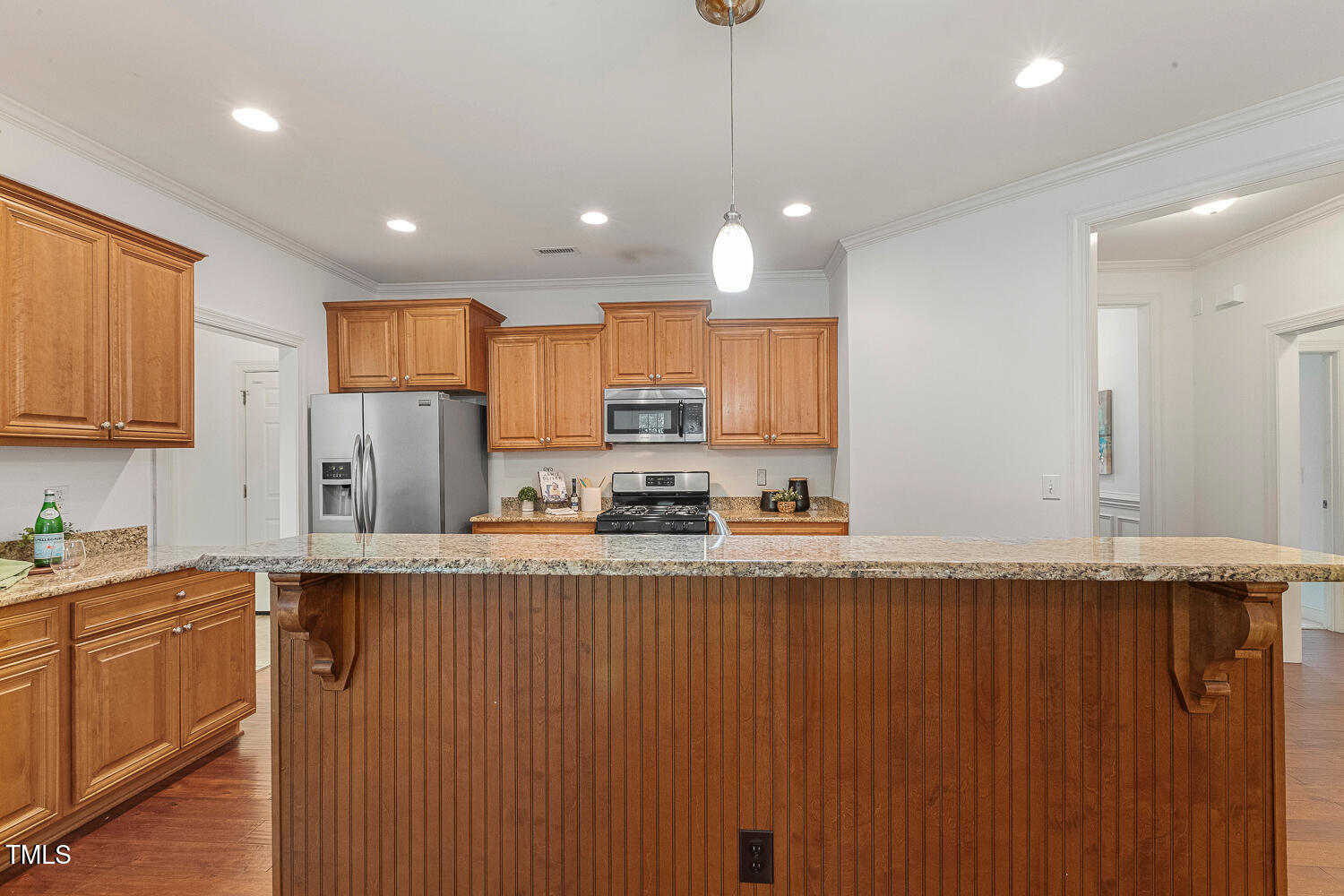 1313 Barnford Mill Road Wake Forest, NC 27587 - Photo 12 of 49 a kitchen with stainless steel appliances granite countertop a refrigerator a sink dishwasher and a cabinets with wooden floor
