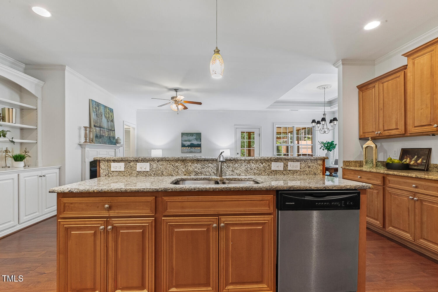 1313 Barnford Mill Road Wake Forest, NC 27587 - Photo 13 of 49 a kitchen with a sink and cabinets