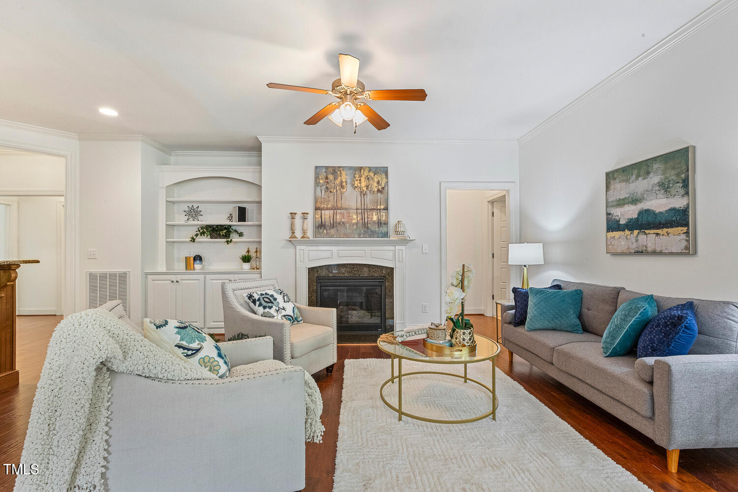1313 Barnford Mill Road Wake Forest, NC 27587 - Photo 18 of 49 a living room with furniture and a fireplace